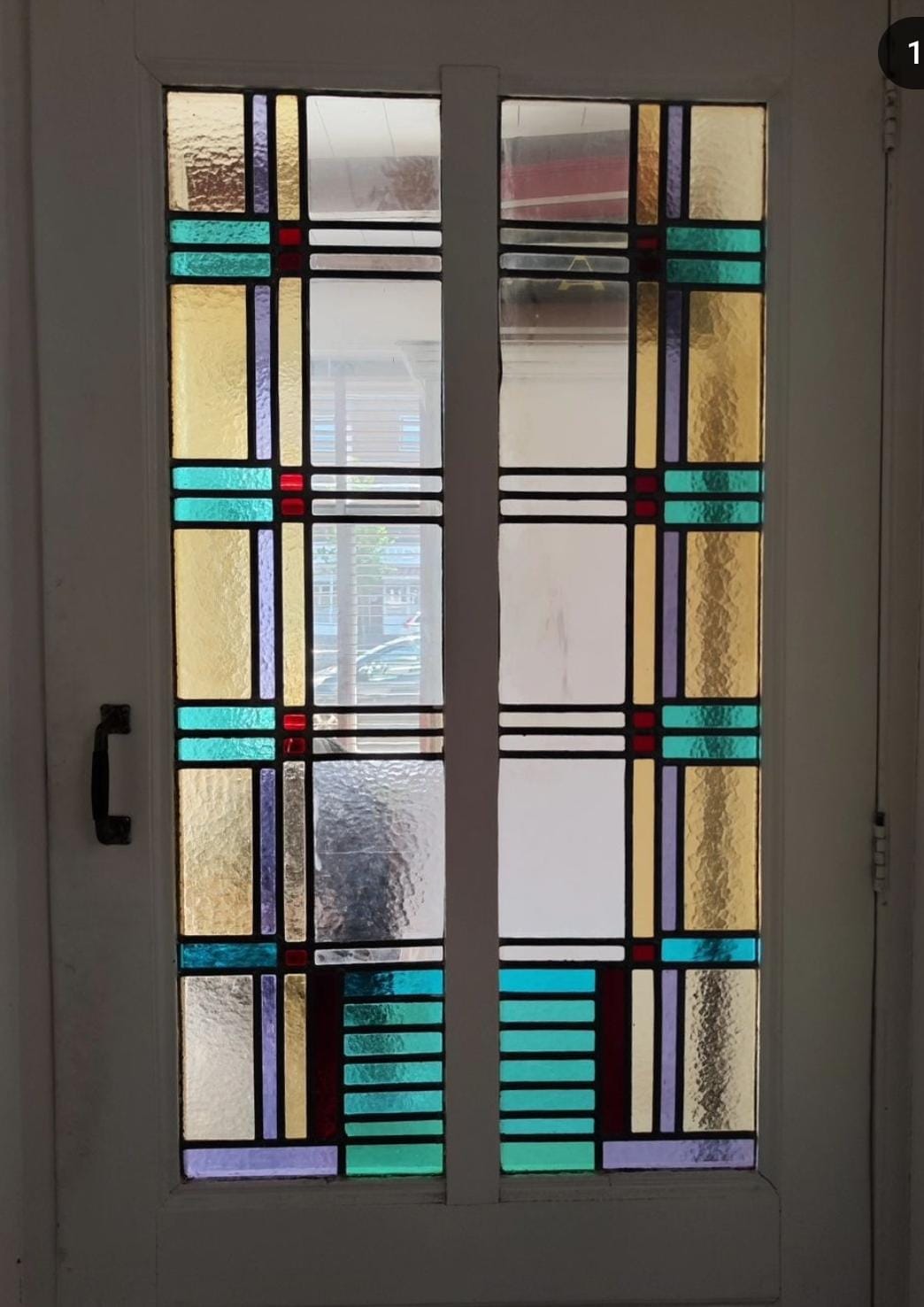 Professionele reparatie van een glas-in-lood paneel in Delft